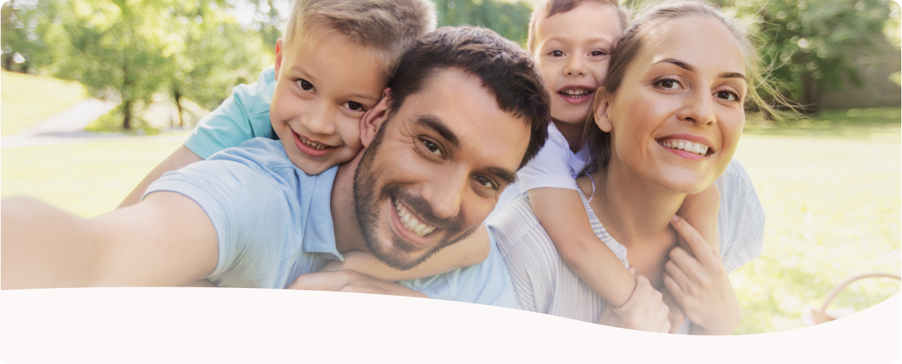 Parents carry their children in their arms.