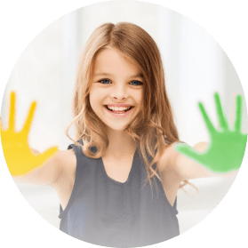 The girl is painting with paints in kindergarten 